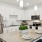a kitchen with white cabinets