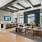 a large living room with a large glass wall