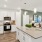 a kitchen with white cabinets