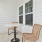 a room with a table and chairs