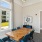 a room with a table and chairs