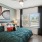 a bedroom with a large window