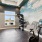a room with a large map and exercise equipment